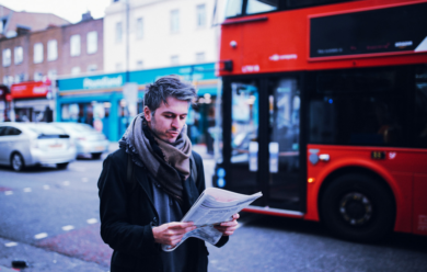 man reading paper